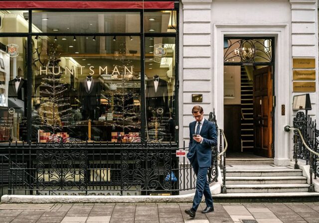 Bespoke mannequins in elegant hallway.