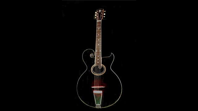 George Harrison and Eric Clapton Wrote a Song With This Rare 1913 Guitar. Now It Can Be Yours.